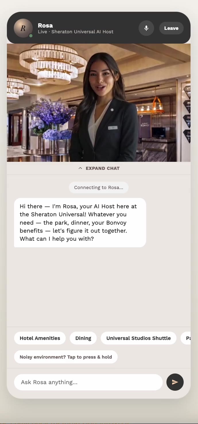 Rosa, the Synth Human host at Sheraton Universal Hotel, on a guest’s phone
